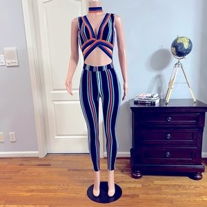 “Primetime” Jumpsuit. Size S. Will fit a M.  Great Stretch & Fit. Like New!